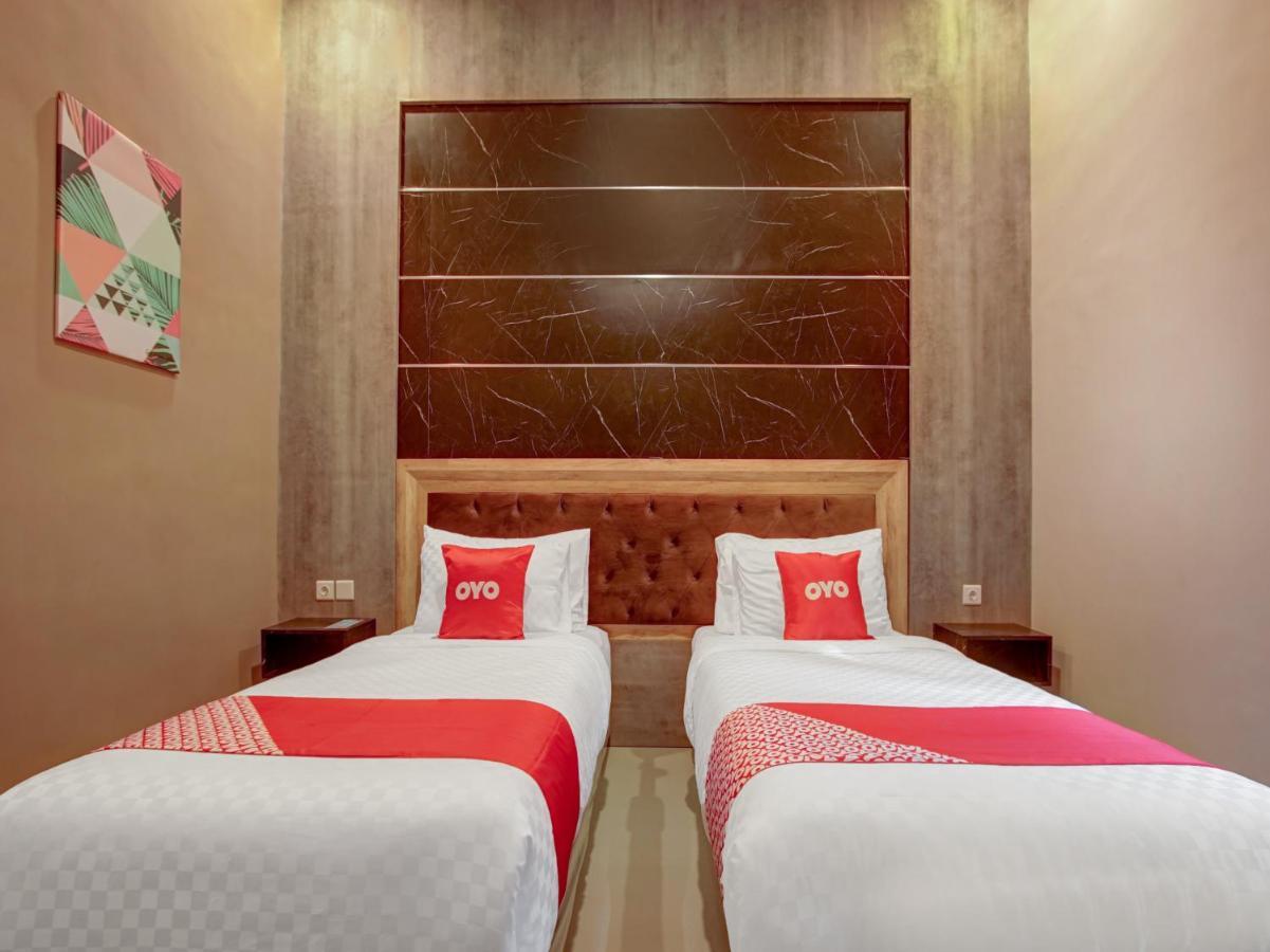 Hotel Capital O 90070 Giri Palma &